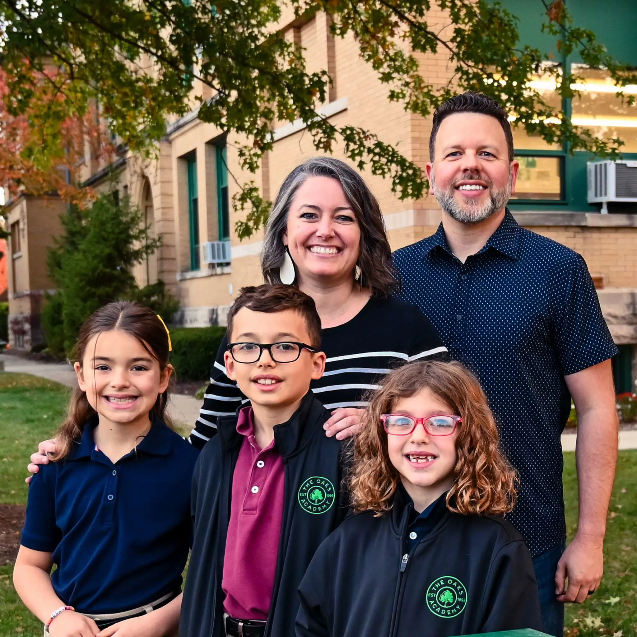 Barbour Family outside the Fall Creek Campus.