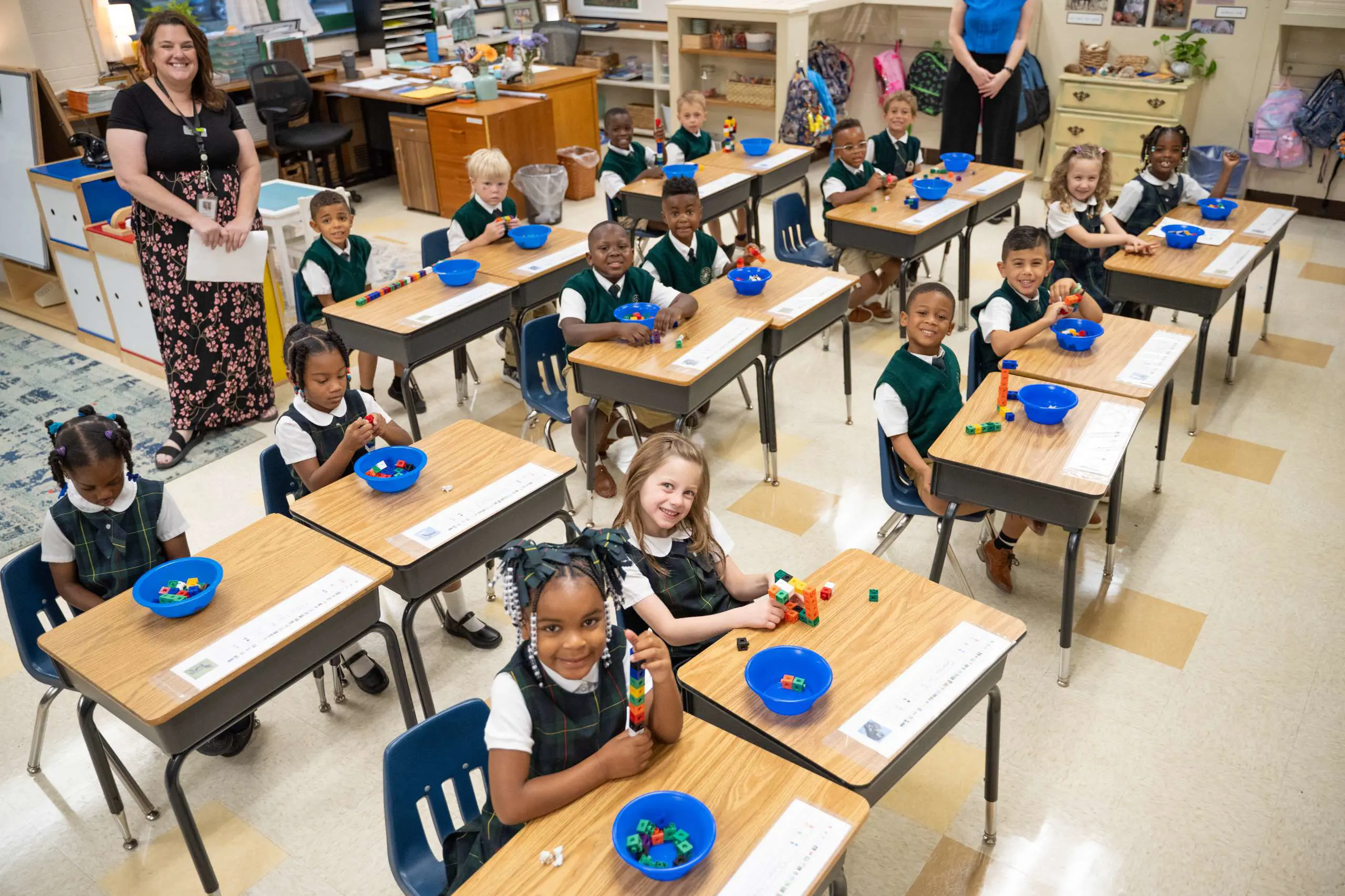 A kindergarten class enjoys their first day of school.