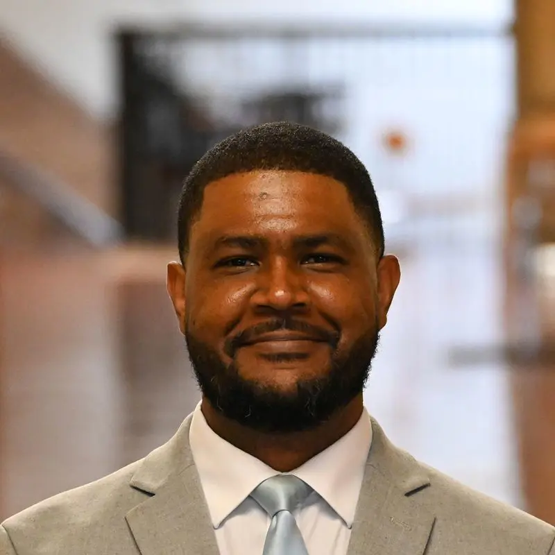 Headshot of Karega Rausch