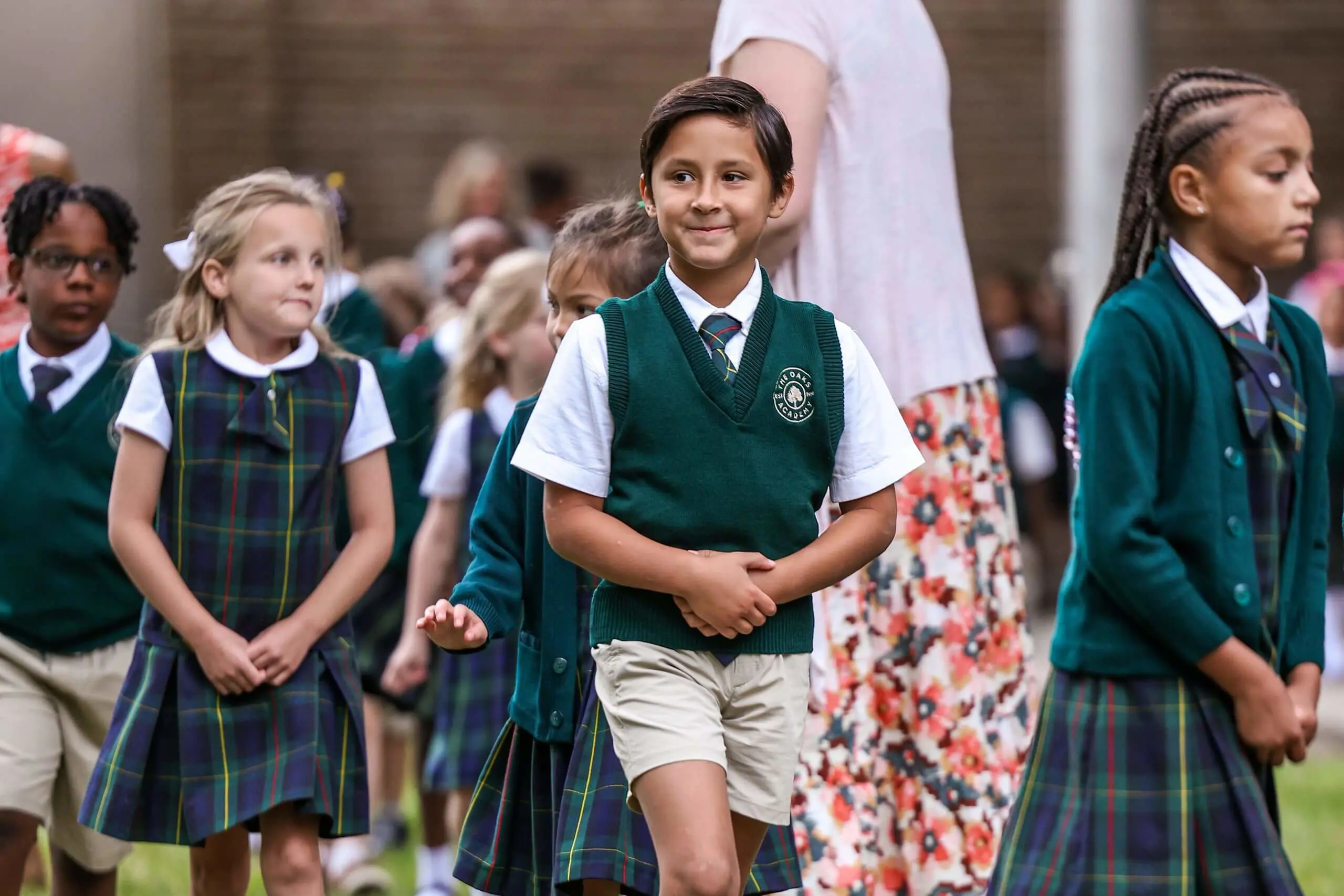 Lower School students walking across campus on 1st day of school.