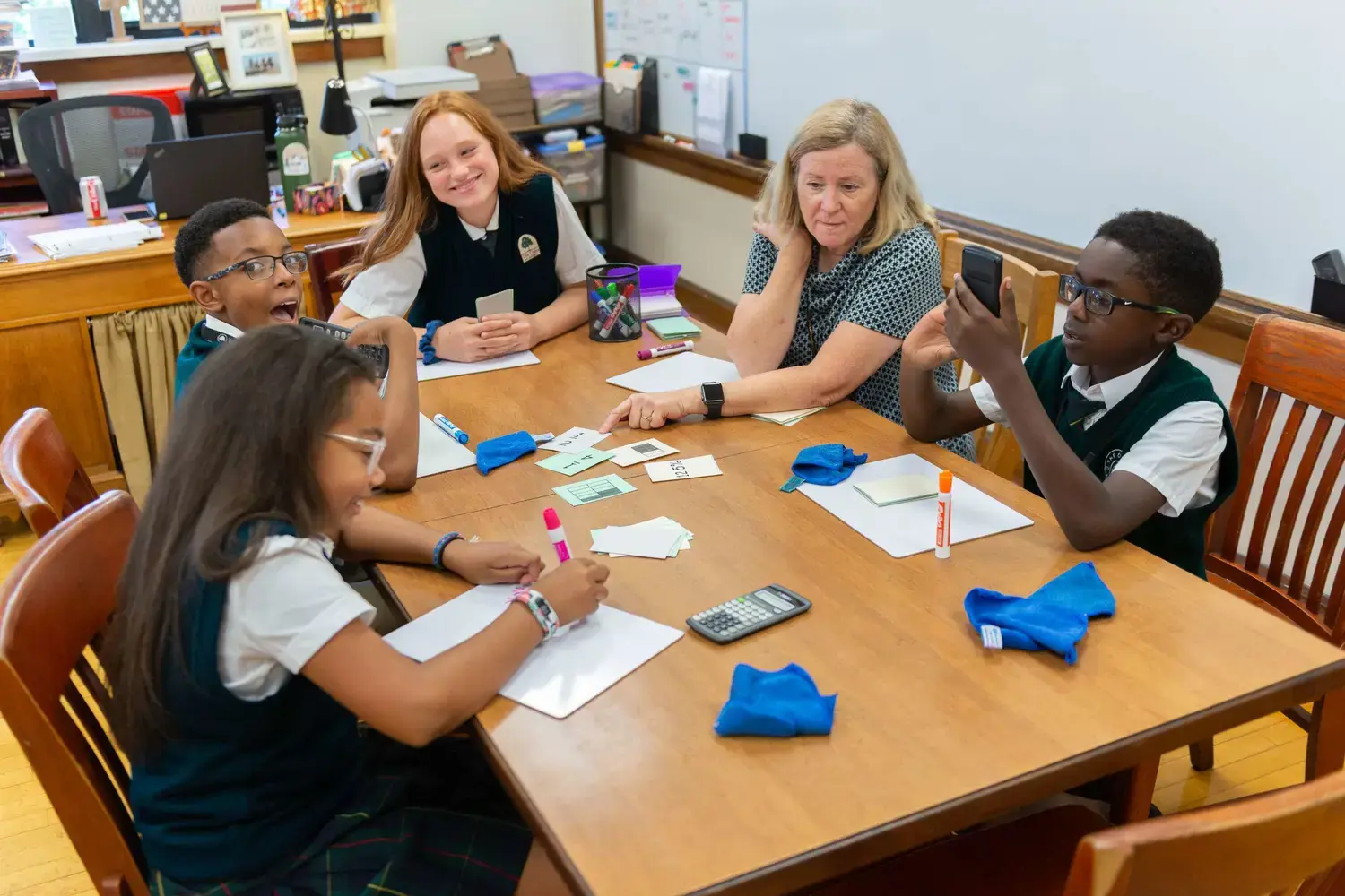 Middle School students and teacher in a small Math group.