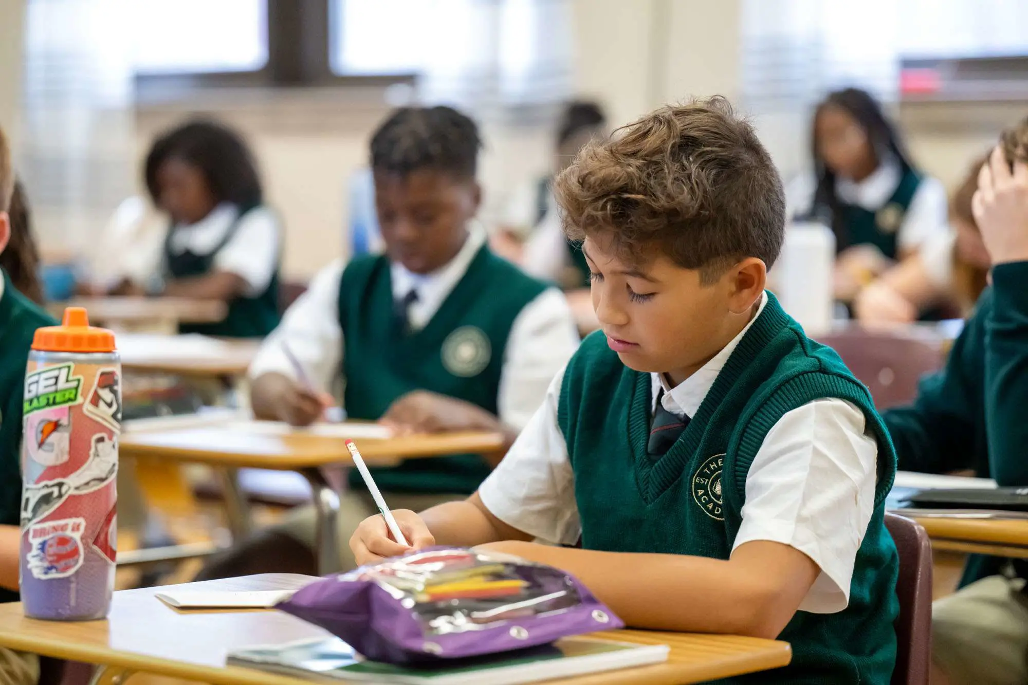Middle school boys working in class.