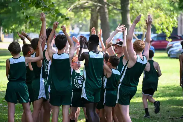 Students in team huddle
